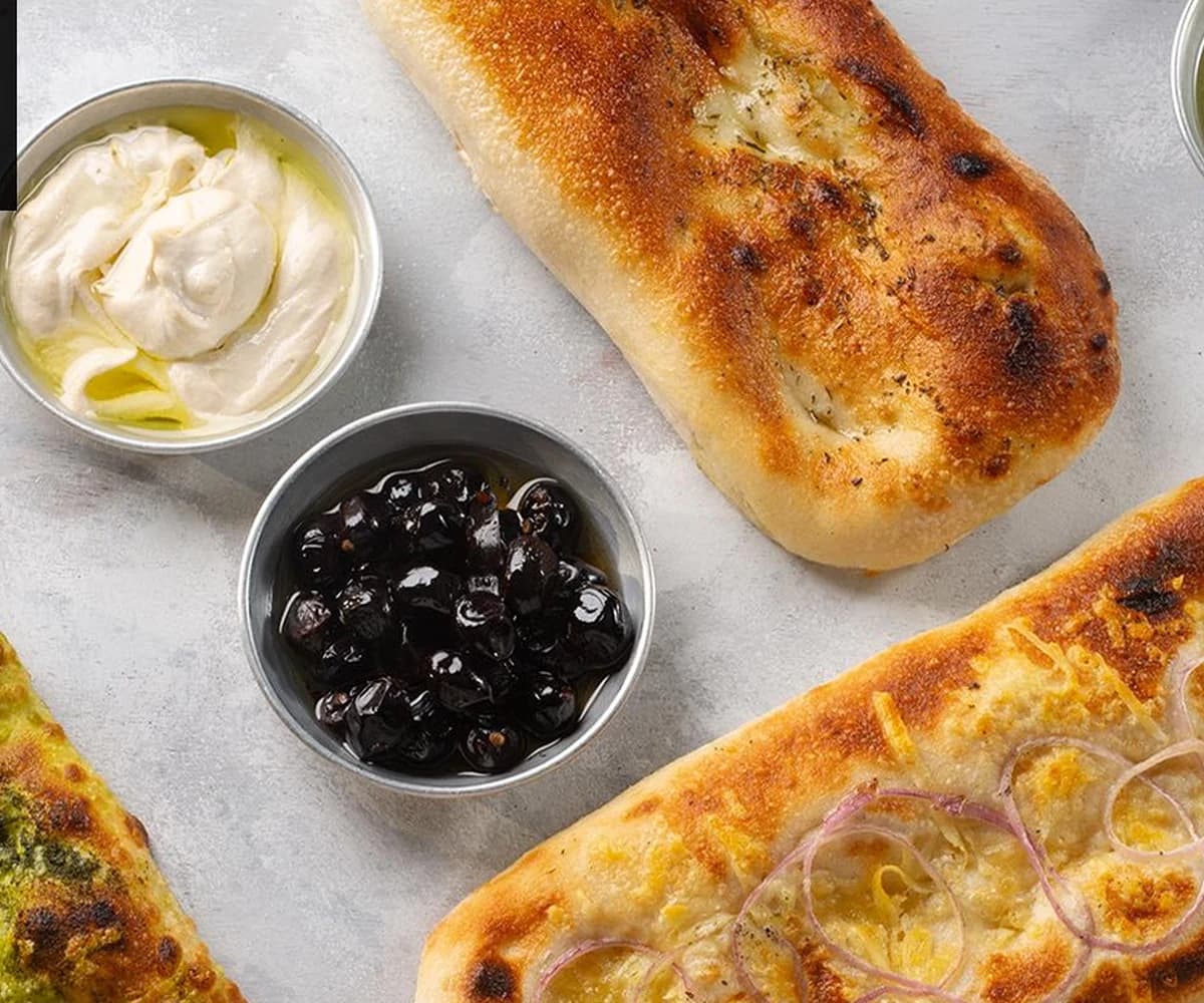 Freshly baked focaccia with olives at ZEST